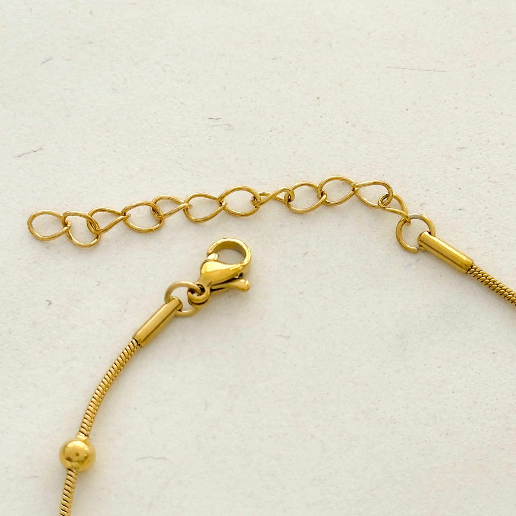 Pulseira em aço com mini esfera