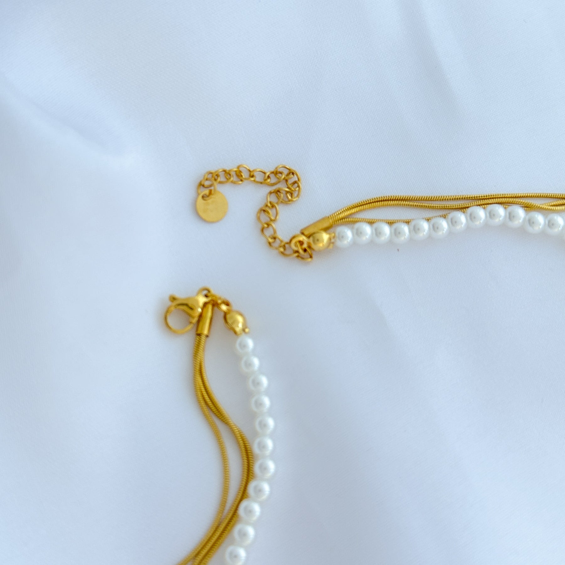 Conjunto mini pérola em aço