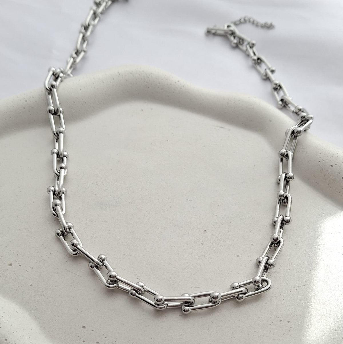 Colar em aço inoxidável