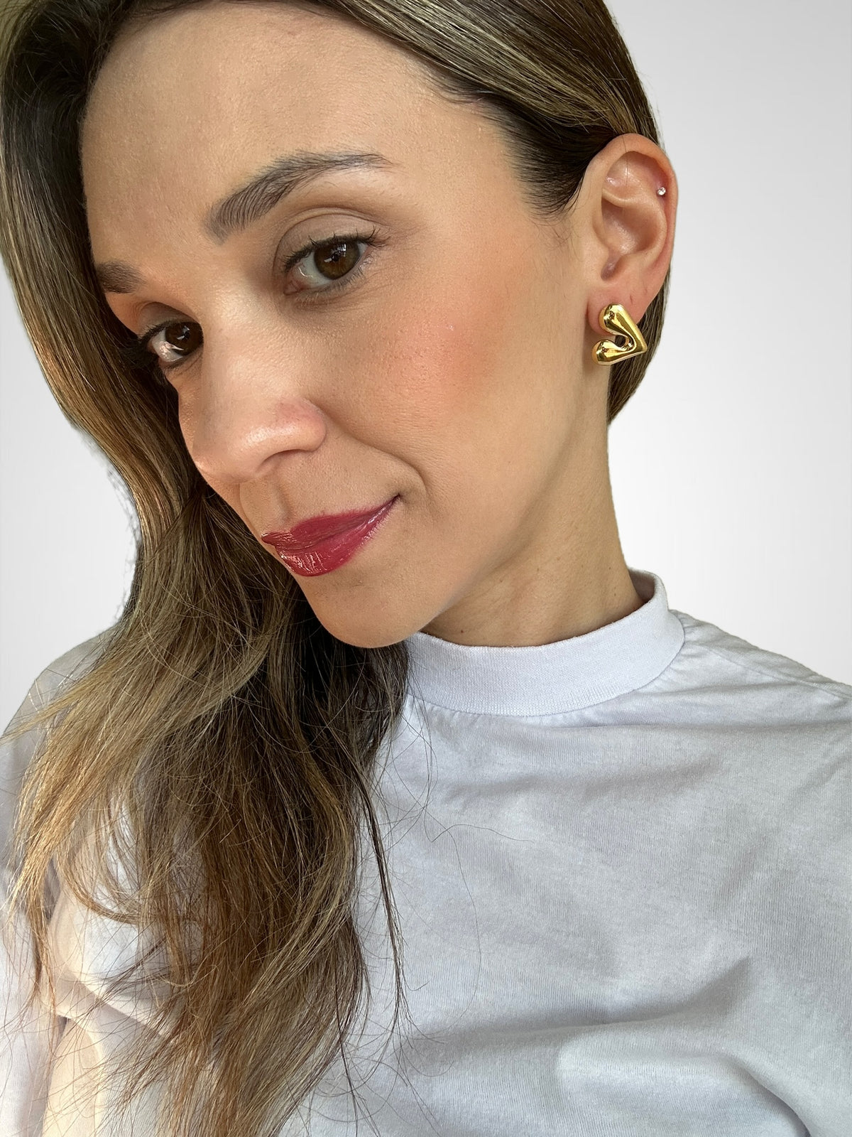 Brinco AÇO - mini coração dourado