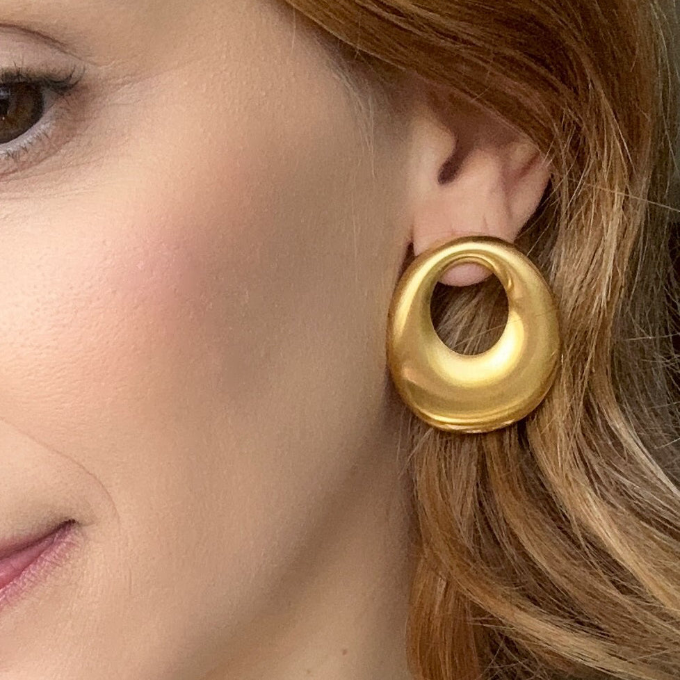 Brinco oval vazado - aço