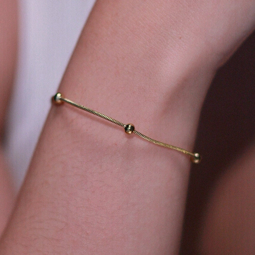 Pulseira em aço com mini esfera