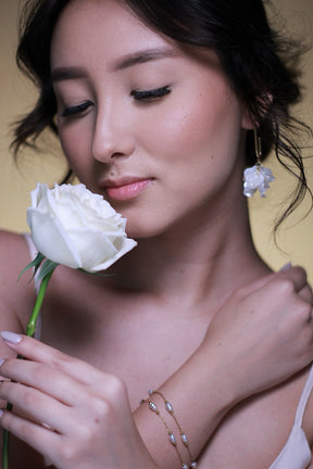 Brinco pétalas em aço