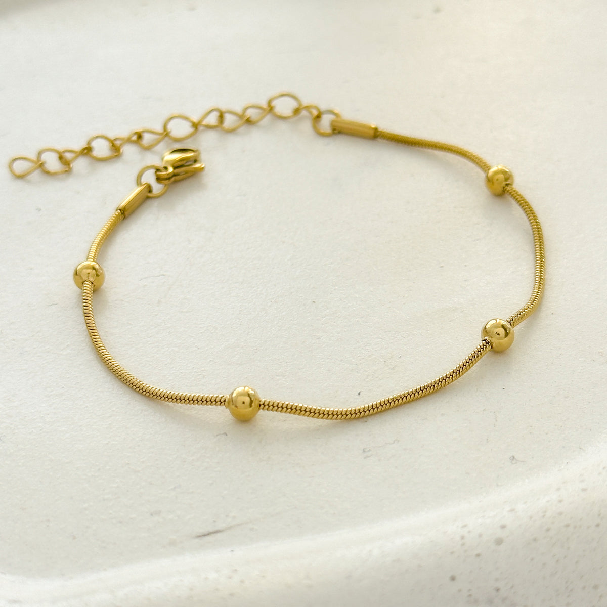 Pulseira em aço com mini esfera