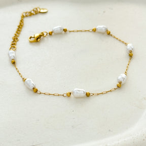 Pulseira em aço com mini pérolas orgânicas