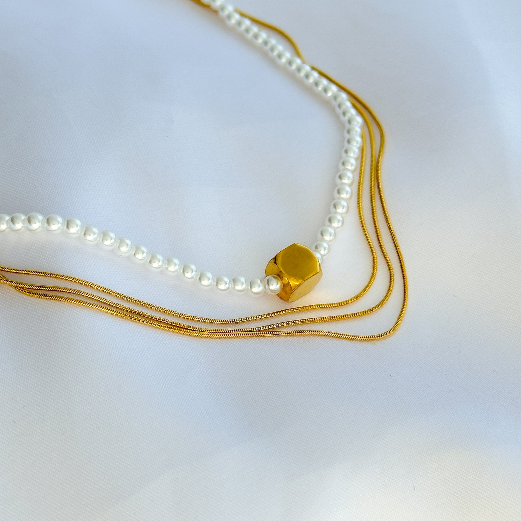 Conjunto mini pérola em aço