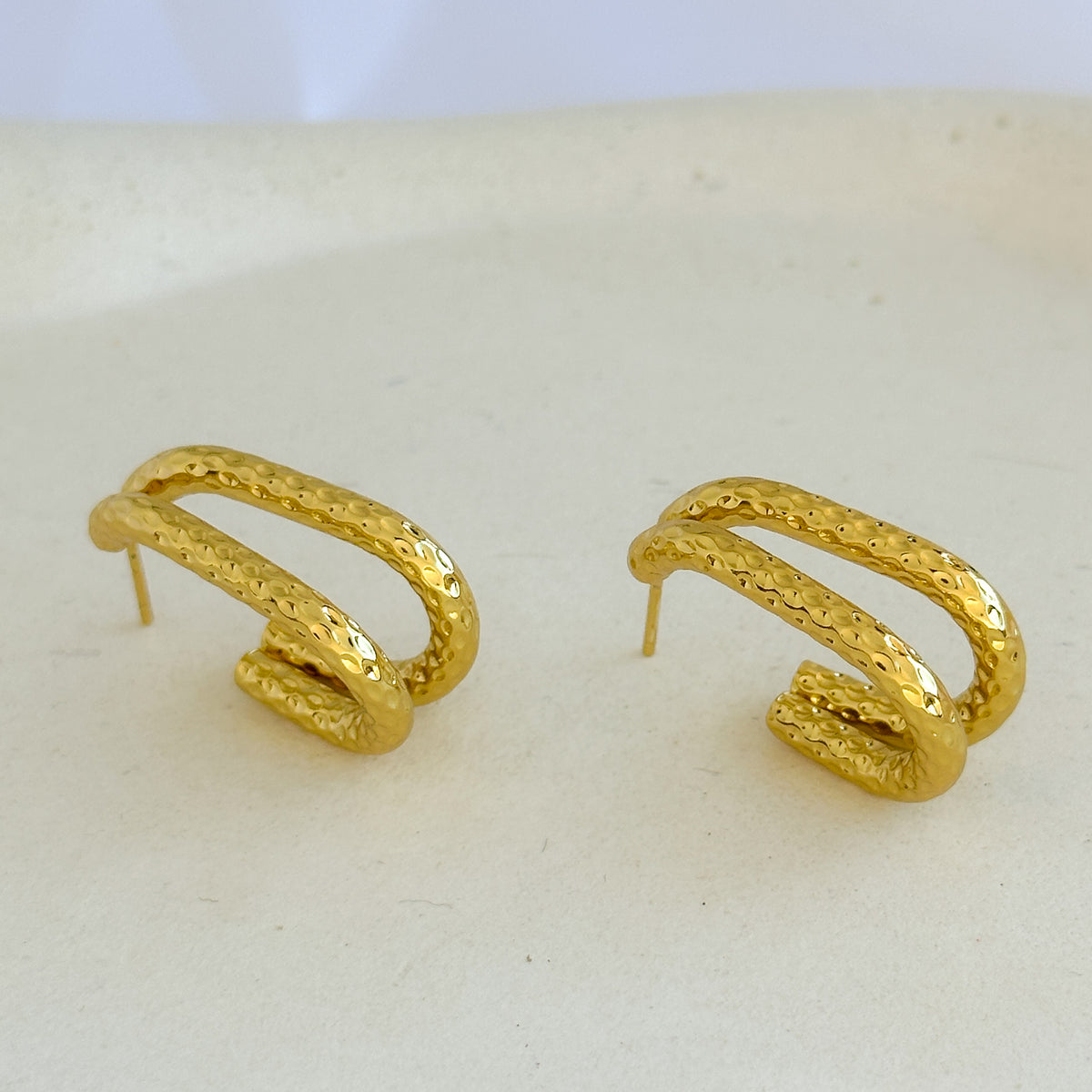 Brinco dourado - Aço