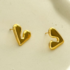 Brinco AÇO - mini coração dourado